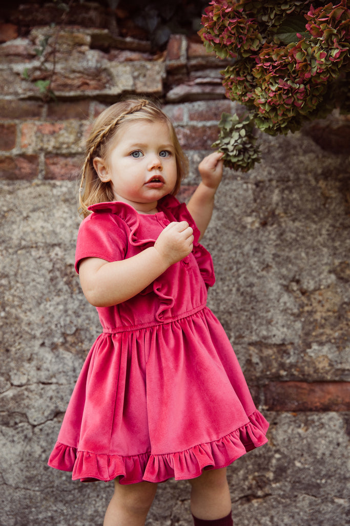 Girls and Childs Autumn Winter French Velvet frill dress in hot pink.